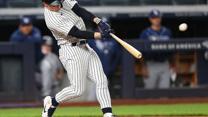 Jun 1, 2021; Bronx, New York, USA; New York Yankees right fielder Clint Frazier (77) hits a walk off game winning two run home run against the Tampa Bay Rays during the eleventh inning at Yankee Stadium. Mandatory Credit: Andy Marlin-USA TODAY Sports