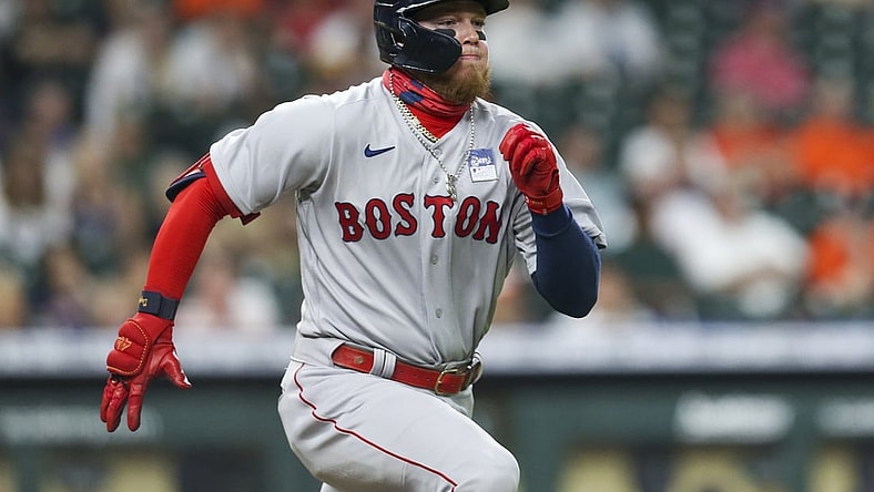 Jun 2, 2021; Houston, Texas, USA; Boston Red Sox left fielder Alex Verdugo (99) runs down the first base line against the Houston Astros in the third inning at Minute Maid Park. Mandatory Credit: Thomas Shea-USA TODAY Sports