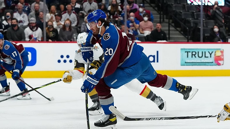 Jun 2, 2021; Denver, Colorado, USA; Colorado Avalanche left wing Brandon Saad (20) shoots and scores a goal in the first period against the Vegas Golden Knights  in game two of the second round of the 2021 Stanley Cup Playoffs at Ball Arena. Mandatory Credit: Ron Chenoy-USA TODAY Sports