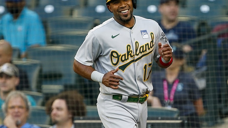 Jun 2, 2021; Seattle, Washington, USA; Oakland Athletics shortstop Elvis Andrus (17) reacts after scoring a run against the Seattle Mariners during the third inning at T-Mobile Park. Mandatory Credit: Joe Nicholson-USA TODAY Sports