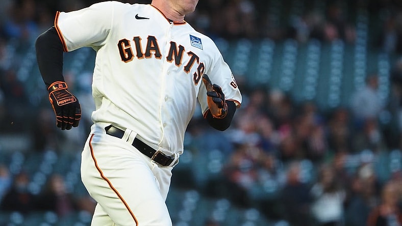 Jun 3, 2021; San Francisco, California, USA; San Francisco Giants starting pitcher Anthony DeSclafani (26) rounds first base for an RBI double against the Chicago Cubs during the fourth inning at Oracle Park. Mandatory Credit: Kelley L Cox-USA TODAY Sports