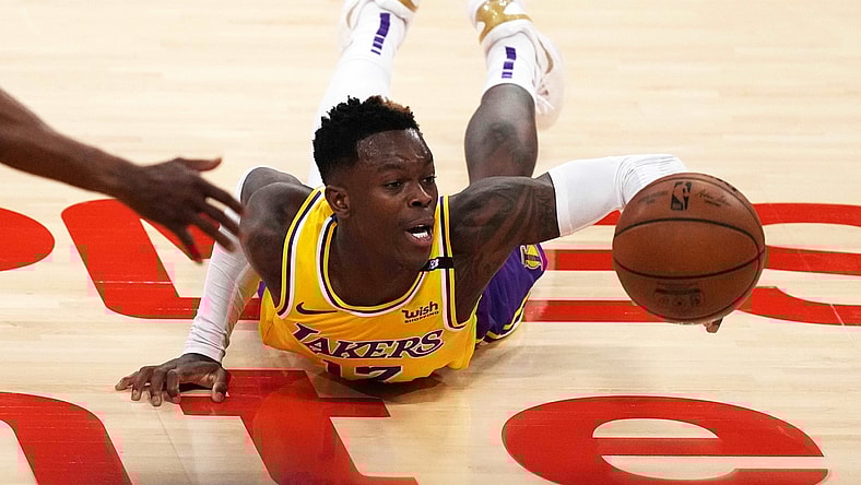 Jun 3, 2021; Los Angeles, California, USA; Los Angeles Lakers guard Dennis Schroder (17) reaches for the ball against the Phoenix Suns in the second half during game six in the first round of the 2021 NBA Playoffs at Staples Center. Mandatory Credit: Kirby Lee-USA TODAY Sports