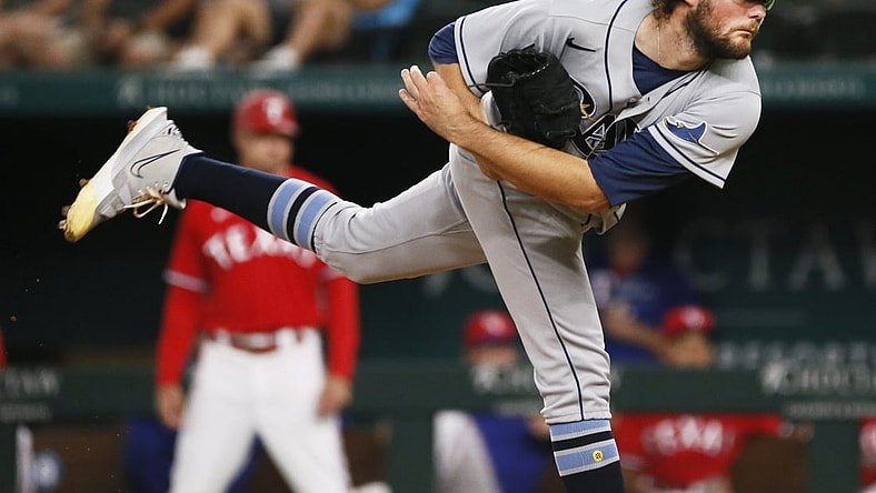Jun 4, 2021; Arlington, Texas, USA; Tampa Bay Rays starting pitcher Josh Fleming (19) follows thru on a pitch during the first inning against the Texas Rangers at Globe Life Field. Mandatory Credit: Raymond Carlin III-USA TODAY Sports