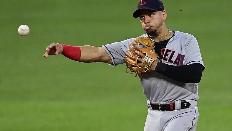 Jun 4, 2021; Baltimore, Maryland, USA;  Cleveland Indians second baseman Cesar Hernandez (7) throws to first base to end the third inning against the Baltimore Orioles at Oriole Park at Camden Yards. Mandatory Credit: Tommy Gilligan-USA TODAY Sports