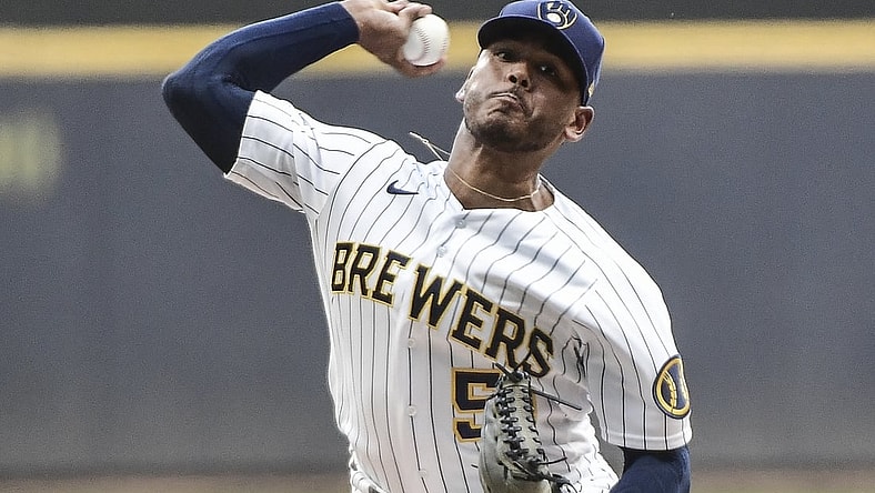 Jun 4, 2021; Milwaukee, Wisconsin, USA;  Milwaukee Brewers pitcher Freddy Peralta (51) pitches in the first inning against the Arizona Diamondbacks at American Family Field. Mandatory Credit: Benny Sieu-USA TODAY Sports