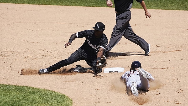 Jun 5, 2021; Chicago, Illinois, USA; Detroit Tigers center fielder Derek Hill (54) steals second base as Chicago White Sox shortstop Tim Anderson (7) takes a late throw during the fifth inning at Guaranteed Rate Field. Mandatory Credit: David Banks-USA TODAY Sports