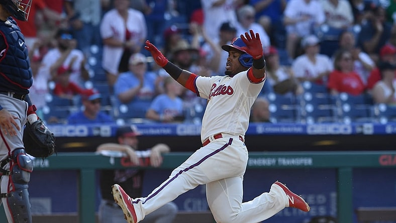 Jun 5, 2021; Philadelphia, Pennsylvania, USA; Philadelphia Phillies infielder Jean Segura (2) slides towards home plate to score a run during the fourth inning against the Washington Nationals at Citizens Bank Park. Mandatory Credit: Kyle Ross-USA TODAY Sports