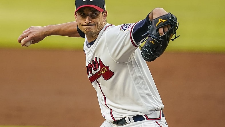Jun 5, 2021; Cumberland, Georgia, USA; Atlanta Braves starting pitcher Charlie Morton (50) pitches against the Los Angeles Dodgers during the third inning at Truist Park. Mandatory Credit: Dale Zanine-USA TODAY Sports