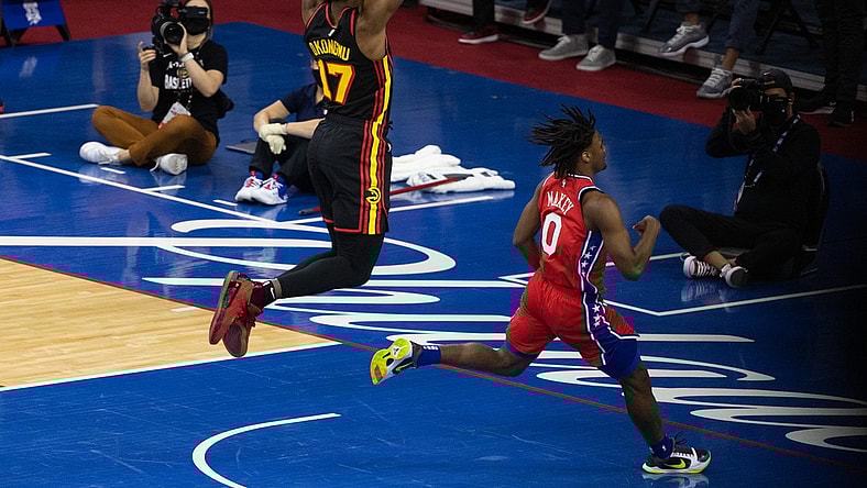 Jun 6, 2021; Philadelphia, Pennsylvania, USA; Atlanta Hawks forward Onyeka Okongwu (17) drives for a dunk past Philadelphia 76ers guard Tyrese Maxey (0) during the second quarter of game one in the second round of the 2021 NBA Playoffs at Wells Fargo Center. Mandatory Credit: Bill Streicher-USA TODAY Sports