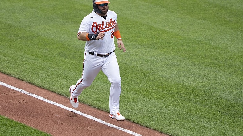 Jun 6, 2021; Baltimore, Maryland, USA; Baltimore Orioles right fielder DJ Stewart (24) scores a run on Baltimore Orioles center fielder Cedric Mullins (31) (not pictured) RBI single during the second inning against the Cleveland Indians at Oriole Park at Camden Yards. Mandatory Credit: Gregory Fisher-USA TODAY Sports