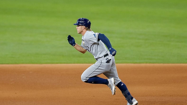 Jun 6, 2021; Arlington, Texas, USA; Tampa Bay Rays shortstop Taylor Walls (6) hits a 2-run go ahead double during the eighth inning against the Texas Rangers at Globe Life Field. Mandatory Credit: Andrew Dieb-USA TODAY Sports