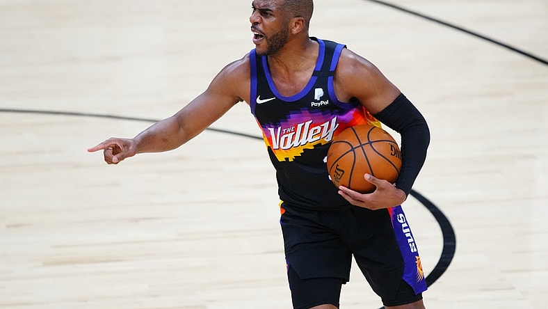 Jun 7, 2021; Phoenix, Arizona, USA; Phoenix Suns guard Chris Paul reacts against the Denver Nuggets in the first half during game one in the second round of the 2021 NBA Playoffs at Phoenix Suns Arena. Mandatory Credit: Mark J. Rebilas-USA TODAY Sports