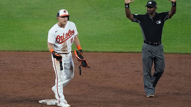 Jun 8, 2021; Baltimore, Maryland, USA; Baltimore Orioles second baseman Pat Valaika (11) calls for timeout after driving in a run with a double in the third inning against the New York Mets at Oriole Park at Camden Yards. Mandatory Credit: Mitch Stringer-USA TODAY Sports