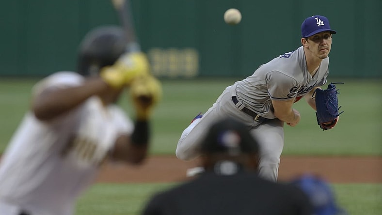 Jun 8, 2021; Pittsburgh, Pennsylvania, USA;  Los Angeles Dodgers starting pitcher Walker Buehler (21) pithes to Pittsburgh Pirates third baseman Ke'Bryan Hayes (13) during the first inning at PNC Park. Mandatory Credit: Charles LeClaire-USA TODAY Sports