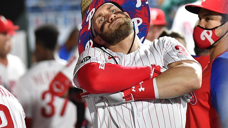 Jun 8, 2021; Philadelphia, Pennsylvania, USA; Philadelphia Phillies right fielder Bryce Harper (3) celebrates in the dugout after hitting a solo home run against the Atlanta Braves during the fourth inning at Citizens Bank Park. Mandatory Credit: Eric Hartline-USA TODAY Sports