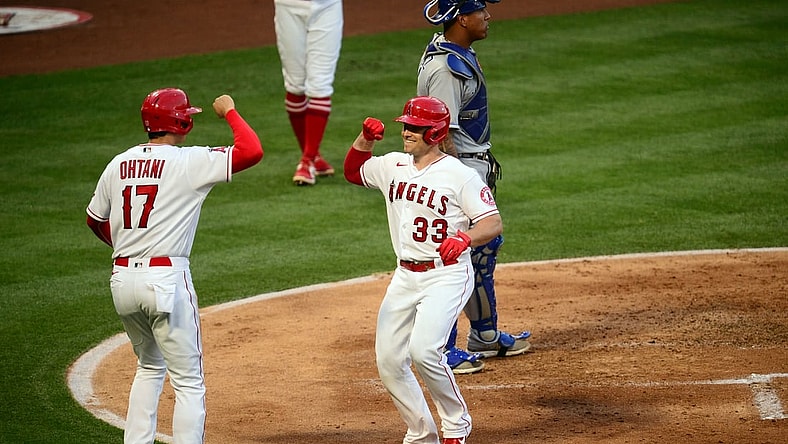 Jun 8, 2021; Anaheim, California, USA; Los Angeles Angels catcher Max Stassi (33) is greeted by designated hitter Shohei Ohtani (17) after hitting a two run home run against the Kansas City Royals during the third inning at Angel Stadium. Mandatory Credit: Gary A. Vasquez-USA TODAY Sports