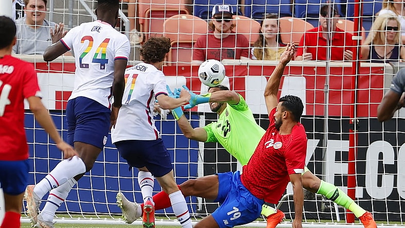 Jun 9, 2021; Sandy, Utah, USA; United State forward Brenden Aaronson (11) shoots for a goal in the first half on Costa Rica goalkeeper Leonel Moreira (23) during an international friendly soccer match at Rio Tinto Stadium. Mandatory Credit: Jeffrey Swinger-USA TODAY Sports