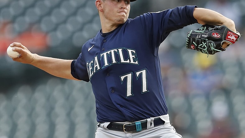 Jun 9, 2021; Detroit, Michigan, USA; Seattle Mariners starting pitcher Chris Flexen (77) throws a pitch during the first inning against the Detroit Tigers at Comerica Park. Mandatory Credit: Raj Mehta-USA TODAY Sports
