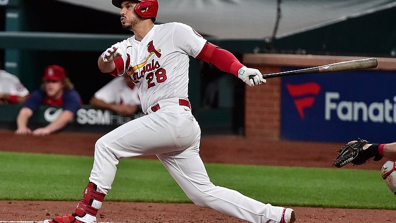Jun 9, 2021; St. Louis, Missouri, USA;  St. Louis Cardinals third baseman Nolan Arenado (28) hits a double during the third inning against the Cleveland Indians at Busch Stadium. Mandatory Credit: Jeff Curry-USA TODAY Sports