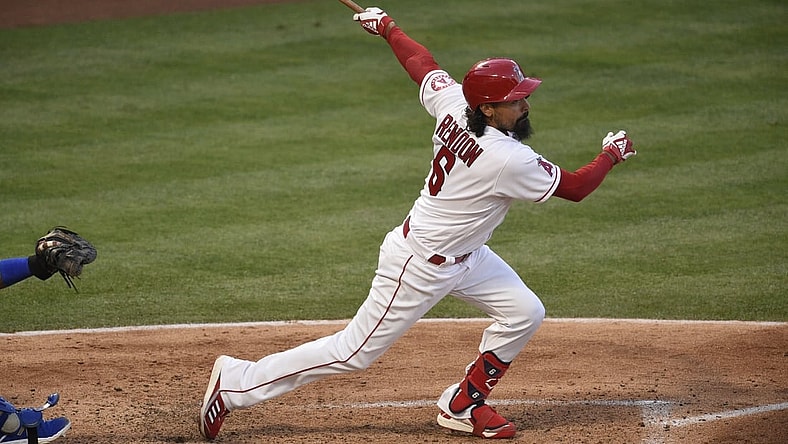 Jun 9, 2021; Anaheim, California, USA; Los Angeles Angels third baseman Anthony Rendon (6) follows through on a swing after hitting a two-run double during the third inning against the Kansas City Royals at Angel Stadium. Mandatory Credit: Kelvin Kuo-USA TODAY Sports