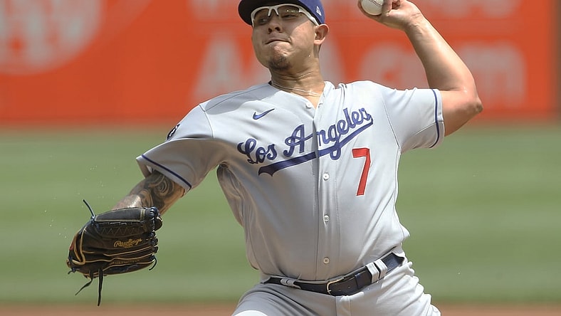 Jun 10, 2021; Pittsburgh, Pennsylvania, USA;  Los Angeles Dodgers starting pitcher Julio Urias (7) delivers a pitch against the Pittsburgh Pirates during the first inning at PNC Park. Mandatory Credit: Charles LeClaire-USA TODAY Sports