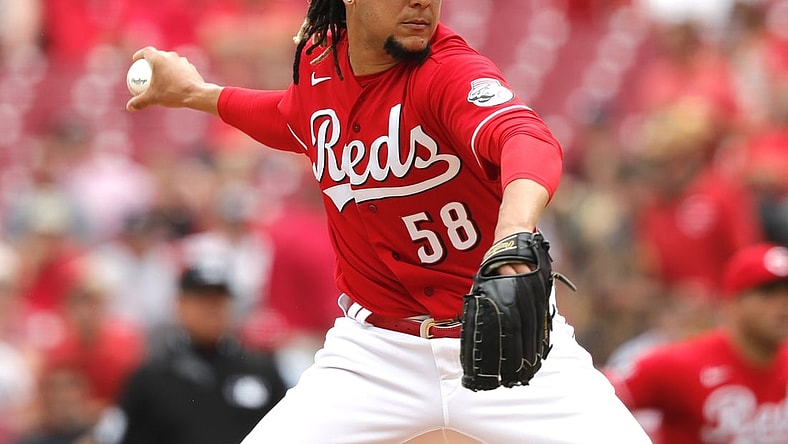 Jun 10, 2021; Cincinnati, Ohio, USA; Cincinnati Reds starting pitcher Luis Castillo (58) throws against the Milwaukee Brewers during the first inning at Great American Ball Park. Mandatory Credit: David Kohl-USA TODAY Sports
