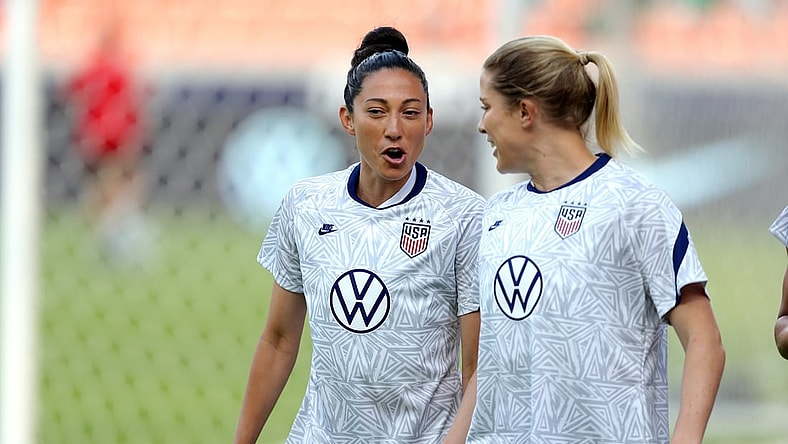 Jun 10, 2021; Houston, Texas, USA; United States forward Christen Press (23, left) and defender Abby Dahlkemper (7) take the field for warmups prior to the match against Portugal during a WNT Summer Series international friendly soccer match at BBVA Stadium. Mandatory Credit: Erik Williams-USA TODAY Sports