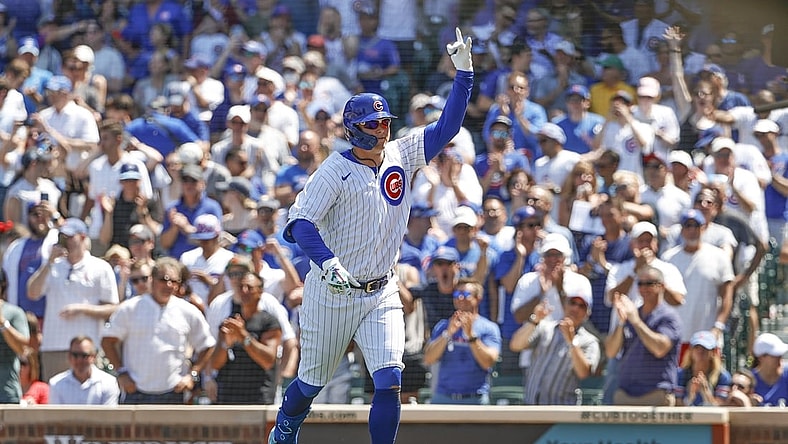 Jun 11, 2021; Chicago, Illinois, USA; Chicago Cubs left fielder Joc Pederson (24) celebrates after hitting a solo home run against the St. Louis Cardinals during the fourth inning at Wrigley Field. Mandatory Credit: Kamil Krzaczynski-USA TODAY Sports