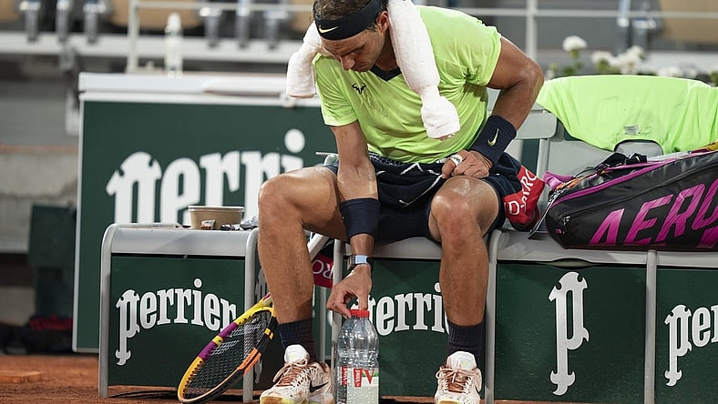Jun 11, 2021; Paris, France; Rafael Nadal (ESP) during a change of ends during his semifinal match against Novak Djokovic (SRB) on day 13 of the French Open at Stade Roland Garros. Mandatory Credit: Susan Mullane-USA TODAY Sports