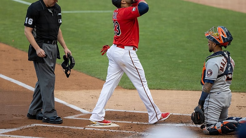 Jun 11, 2021; Minneapolis, Minnesota, USA; Minnesota Twins designated hitter Nelson Cruz (23) celebrates after hitting a solo home run during the first inning against the Houston Astros at Target Field. Mandatory Credit: Jordan Johnson-USA TODAY Sports