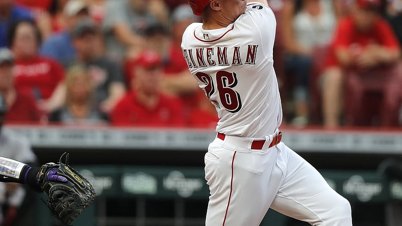 Jun 11, 2021; Cincinnati, Ohio, USA; Cincinnati Reds center fielder Scott Heineman (26) hits a two-run home run against the Colorado Rockies during the second inning at Great American Ball Park. Mandatory Credit: David Kohl-USA TODAY Sports