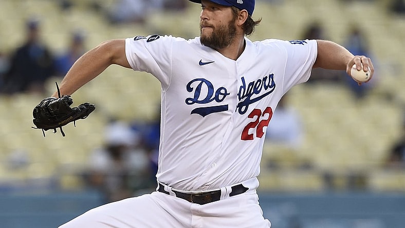 Jun 11, 2021; Los Angeles, California, USA; Los Angeles Dodgers starting pitcher Clayton Kershaw (22) delivers a pitch during the first inning against the Texas Rangers at Dodger Stadium. Mandatory Credit: Kelvin Kuo-USA TODAY Sports