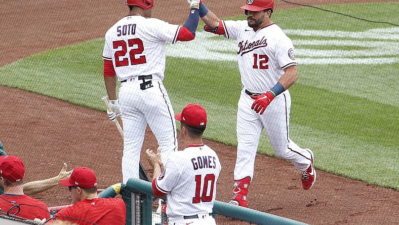 Jun 12, 2021; Washington, District of Columbia, USA; Washington Nationals left fielder Kyle Schwarber (12) celebrates with Nationals right fielder Juan Soto (22) after hitting a solo home run against the San Francisco Giants during the first inning at Nationals Park. Mandatory Credit: Amber Searls-USA TODAY Sports
