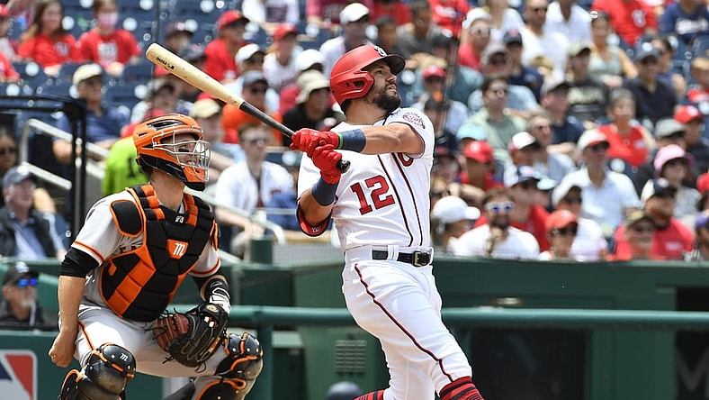 Jun 13, 2021; Washington, District of Columbia, USA; Washington Nationals left fielder Kyle Schwarber (12) hits a three run home run against the San Francisco Giants during the second inning at Nationals Park. Mandatory Credit: Brad Mills-USA TODAY Sports
