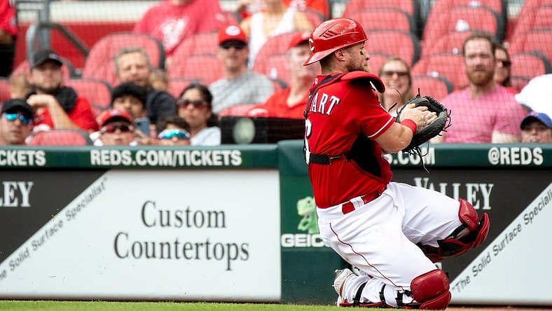 Cincinnati Reds catcher Tucker Barnhart (16) catches a foul ball in the second inning of the MLB game between Cincinnati Reds and Colorado Rockies at Great American Ball Park on Sunday, June 13, 2021, in downtown Cincinnati.

Cincinnati Reds Colorado Rockies