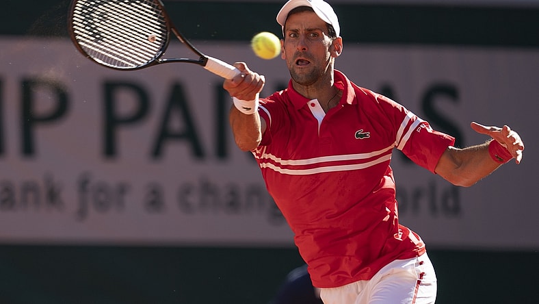 Jun 13, 2021; Paris, France; Novak Djokovic (SRB) in action during the men's final against Stefanos Tsitsipas (GRE) on day 15 of the French Open at Stade Roland Garros. Mandatory Credit: Susan Mullane-USA TODAY Sports
