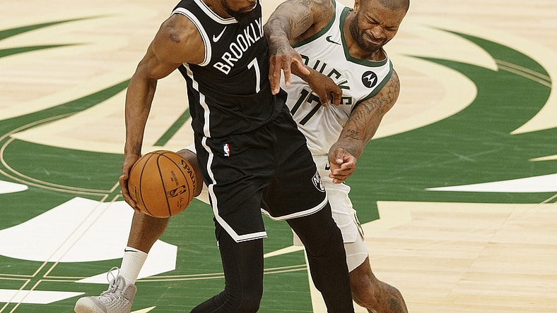 Jun 13, 2021; Milwaukee, Wisconsin, USA; Milwaukee Bucks forward P.J. Tucker (17) defends Brooklyn Nets forward Kevin Durant (7) during the third quarter during game four in the second round of the 2021 NBA Playoffs. at Fiserv Forum. Mandatory Credit: Jeff Hanisch-USA TODAY Sports