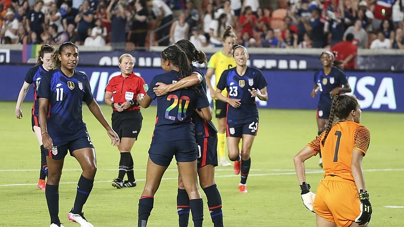 Jun 13, 2021; Houston, Texas, USA; United States defender Margaret Purce (20) celebrates her goal against Jamaica goalkeeper Sydney Schneider (1) in the first half during a WNT Summer Series international friendly soccer match at BBVA Stadium. Mandatory Credit: Thomas Shea-USA TODAY Sports