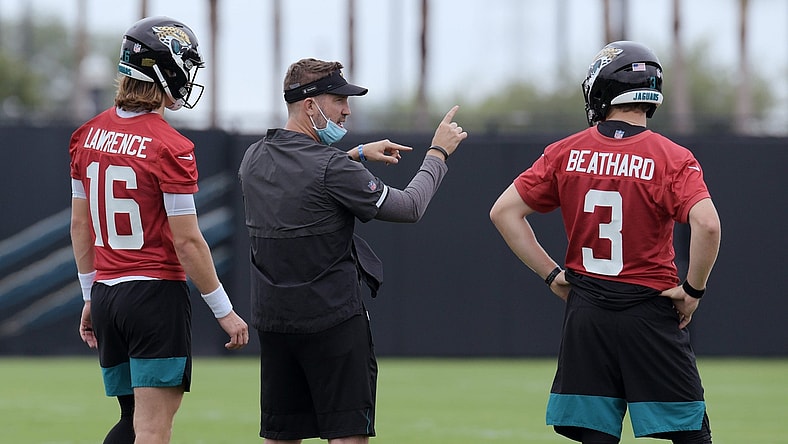 Jaguars Passing Game Coordinator Brian Schottenheimer with quarterbacks (16) Trevor Lawrence and (3) C.J. Beathard on the practice fields outside TIAA Bank Field during the Jacksonville Jaguars  mandatory veterans minicamp session Monday morning, June 14, 2021.

Jki 061421 Jaguarsveteransminicamp 22