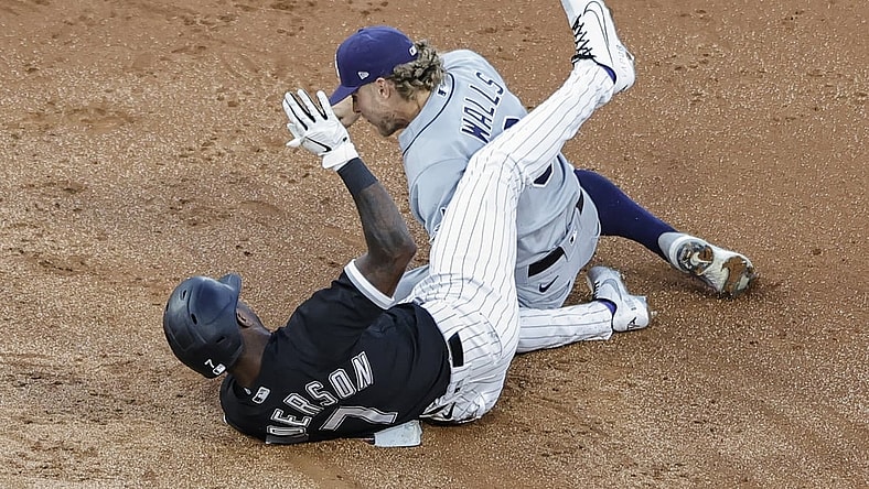 Jun 14, 2021; Chicago, Illinois, USA; Chicago White Sox shortstop Tim Anderson (7) is safe at second base after hitting a double as Tampa Bay Rays shortstop Taylor Walls (6) applies a late tag during the third inning at Guaranteed Rate Field. Mandatory Credit: Kamil Krzaczynski-USA TODAY Sports