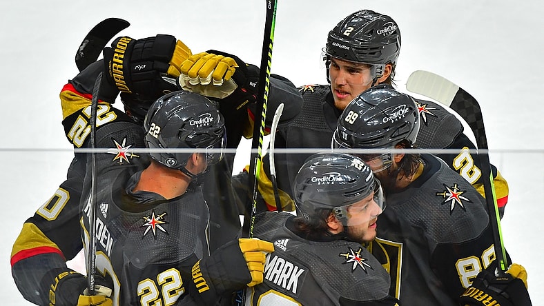 Jun 14, 2021; Las Vegas, Nevada, USA; Vegas Golden Knights center Mattias Janmark (26) celebrates with team mates after scoring a second period goal against the Montreal Canadiens in game one of the 2021 Stanley Cup Semifinals at T-Mobile Arena. Mandatory Credit: Stephen R. Sylvanie-USA TODAY Sports