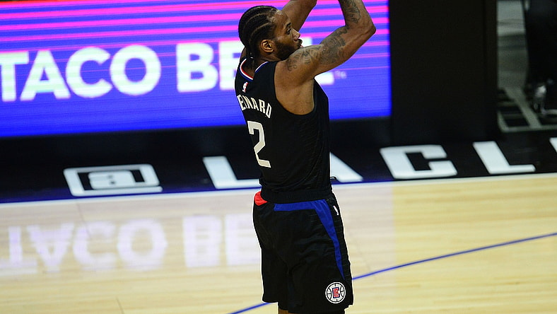 Jun 14, 2021; Los Angeles, California, USA; Los Angeles Clippers forward Kawhi Leonard (2) shoots against the Utah Jazz during the first half in game four in the second round of the 2021 NBA Playoffs. at Staples Center. Mandatory Credit: Gary A. Vasquez-USA TODAY Sports