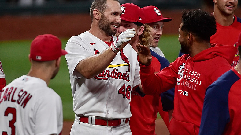 Jun 15, 2021; St. Louis, Missouri, USA;  St. Louis Cardinals first baseman Paul Goldschmidt (46) is congratulated by teammates at home plate after hitting a walk off solo home run during the ninth inning against the Miami Marlins at Busch Stadium. Mandatory Credit: Jeff Curry-USA TODAY Sports