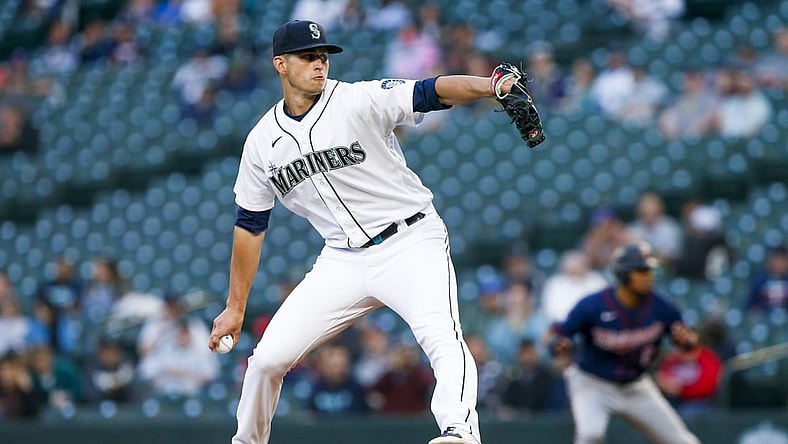 Jun 15, 2021; Seattle, Washington, USA; Seattle Mariners starting pitcher Chris Flexen (77) throws against the Minnesota Twins during the fourth inning at T-Mobile Park. Mandatory Credit: Joe Nicholson-USA TODAY Sports