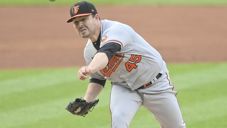 Jun 16, 2021; Cleveland, Ohio, USA; Baltimore Orioles starting pitcher Keegan Akin (45) delivers a pitch in the first inning against the Cleveland Indians at Progressive Field. Mandatory Credit: David Richard-USA TODAY Sports