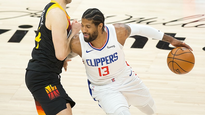 Jun 16, 2021; Salt Lake City, Utah, USA; LA Clippers guard Paul George (13) dribbles the ball against Utah Jazz forward Bojan Bogdanovic (44) during the first quarter of game five in the second round of the 2021 NBA Playoffs at Vivint Arena. Mandatory Credit: Russell Isabella-USA TODAY Sports