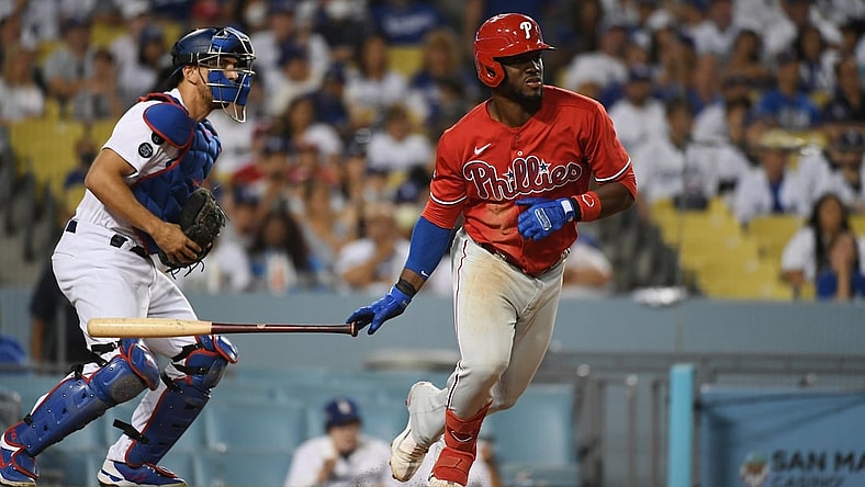Jun 16, 2021; Los Angeles, California, USA; Philadelphia Phillies center fielder Odubel Herrera (37) hits a ground ball against the Los Angeles Dodgers during the fifth inning at Dodger Stadium. Mandatory Credit: Richard Mackson-USA TODAY Sports
