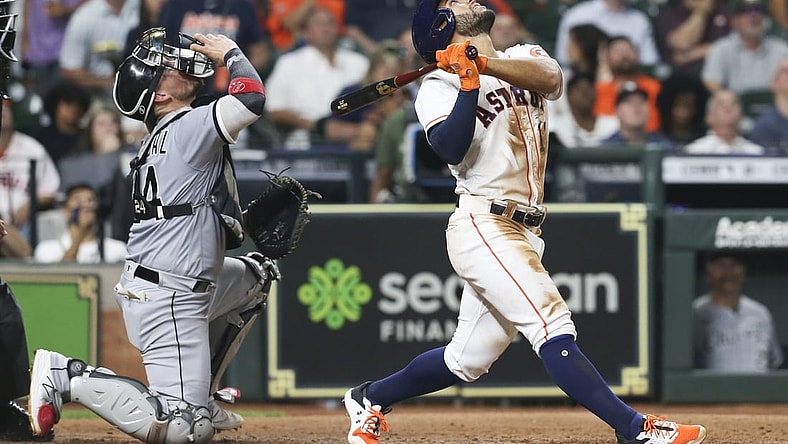 Jun 17, 2021; Houston, Texas, USA;  Houston Astros third baseman Abraham Toro (13) pops up a foul ball for an out with the bases loaded against the Chicago White Sox in the fifth inning at Minute Maid Park. Mandatory Credit: Thomas Shea-USA TODAY Sports
