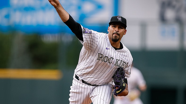 Jun 18, 2021; Denver, Colorado, USA; Colorado Rockies starting pitcher Antonio Senzatela (49) pitches in the first inning against the Milwaukee Brewers at Coors Field. Mandatory Credit: Isaiah J. Downing-USA TODAY Sports