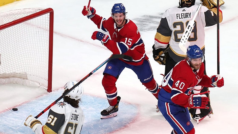 Jun 18, 2021; Montreal, Quebec, CAN; Montreal Canadiens center Jesperi Kotkaniemi (15) and right wing Joel Armia (40) celebrate a goal by right wing Josh Anderson (not pictured) against Vegas Golden Knights goaltender Marc-Andre Fleury (29) during the third period in game three of the 2021 Stanley Cup Semifinals at Bell Centre. Mandatory Credit: Jean-Yves Ahern-USA TODAY Sports